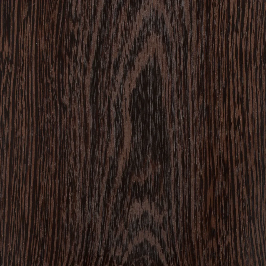 Close-up of dark brown stained wood showing vertical grain with alternating light and dark streaks and a subtle cathedral-shaped pattern in the center.